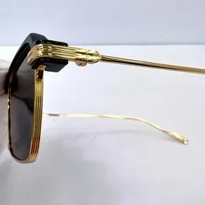 JOHN VARVANTOS GOLD METAL FRAME WITH GLOSSY BLACK ACCENT SUNGLASSES, GREY LENSES John Varvatos SJV550 Sunglasses - Daniel Walters Eyewear main image 4